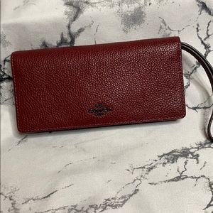 Coach Slim Wallet Wrislet Color: Wine Leather